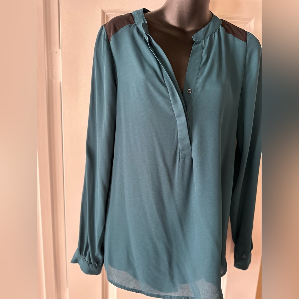 Green and black shirt